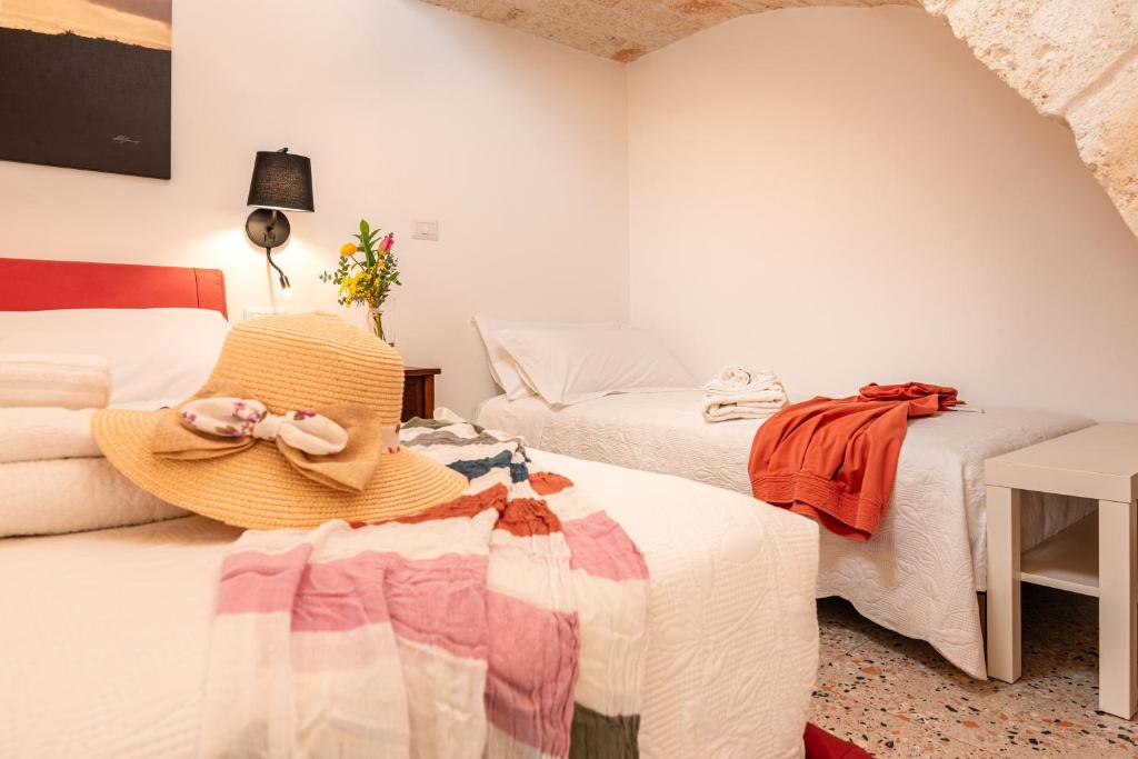 Postel nebo postele na pokoji v ubytování La casa di Benedetta