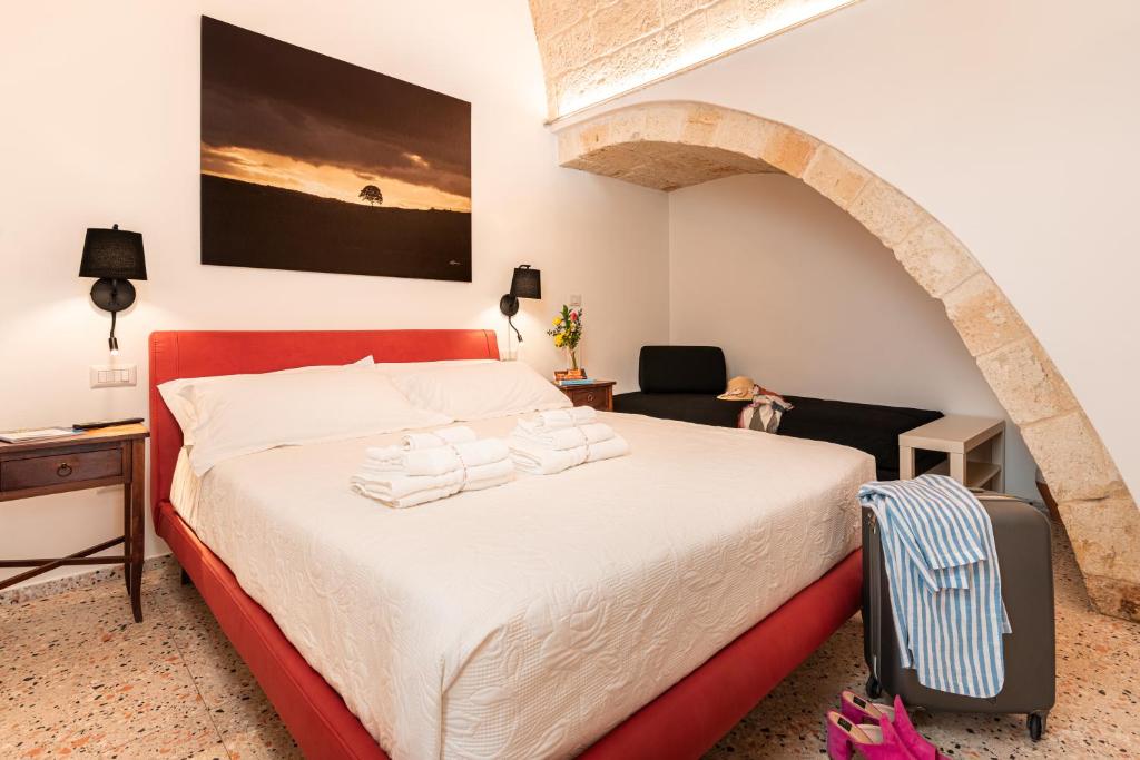 Postel nebo postele na pokoji v ubytování La casa di Benedetta