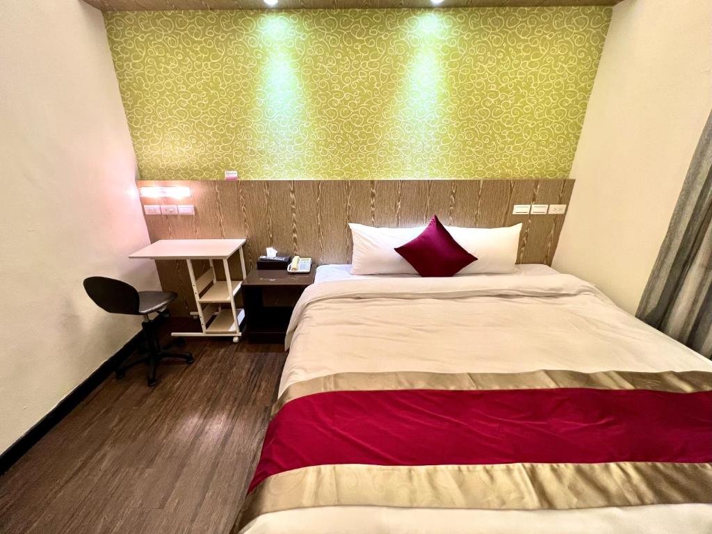 Postel nebo postele na pokoji v ubytování Zhao Lai Hotel