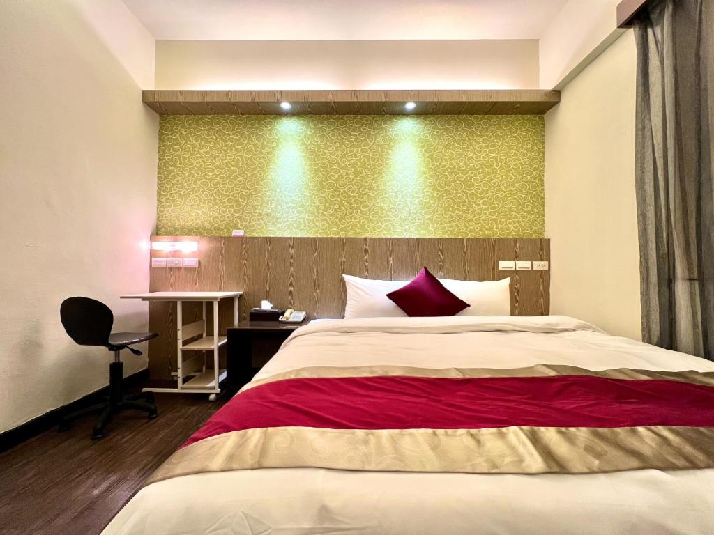 Postel nebo postele na pokoji v ubytování Zhao Lai Hotel