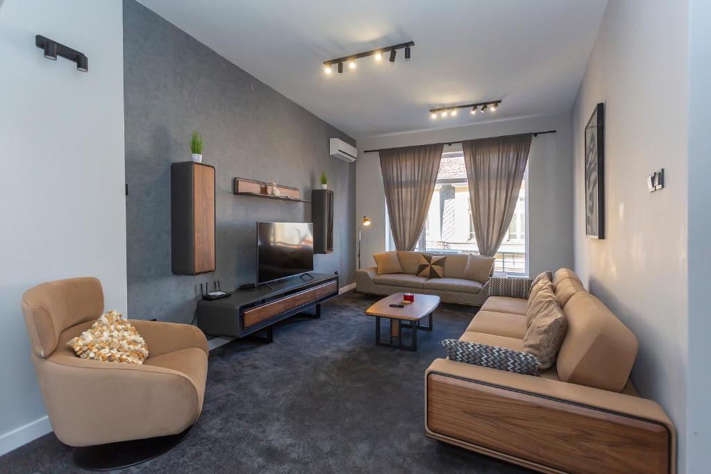 Posezení v ubytování Urban Elegance Apartment