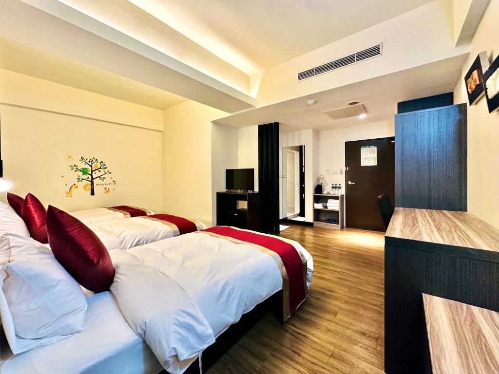 Postel nebo postele na pokoji v ubytování Zhao Lai Hotel