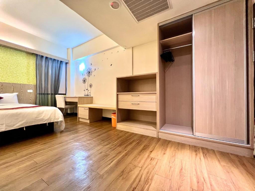 Postel nebo postele na pokoji v ubytování Zhao Lai Hotel