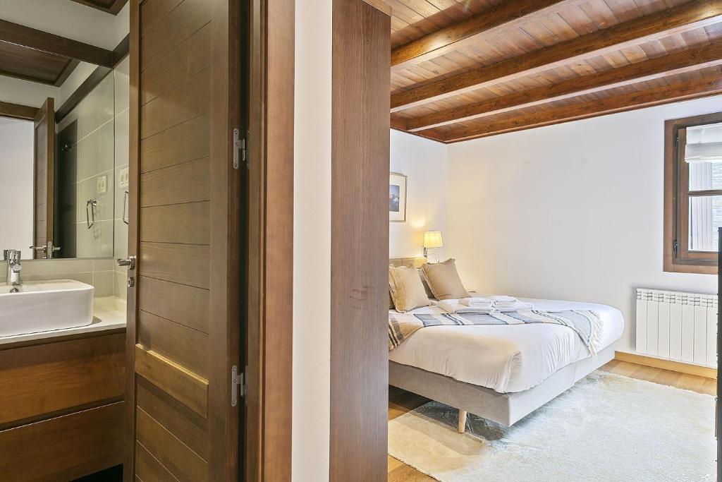 Postel nebo postele na pokoji v ubytování Luderna - Apartamento Val de Ruda B14 Paulet