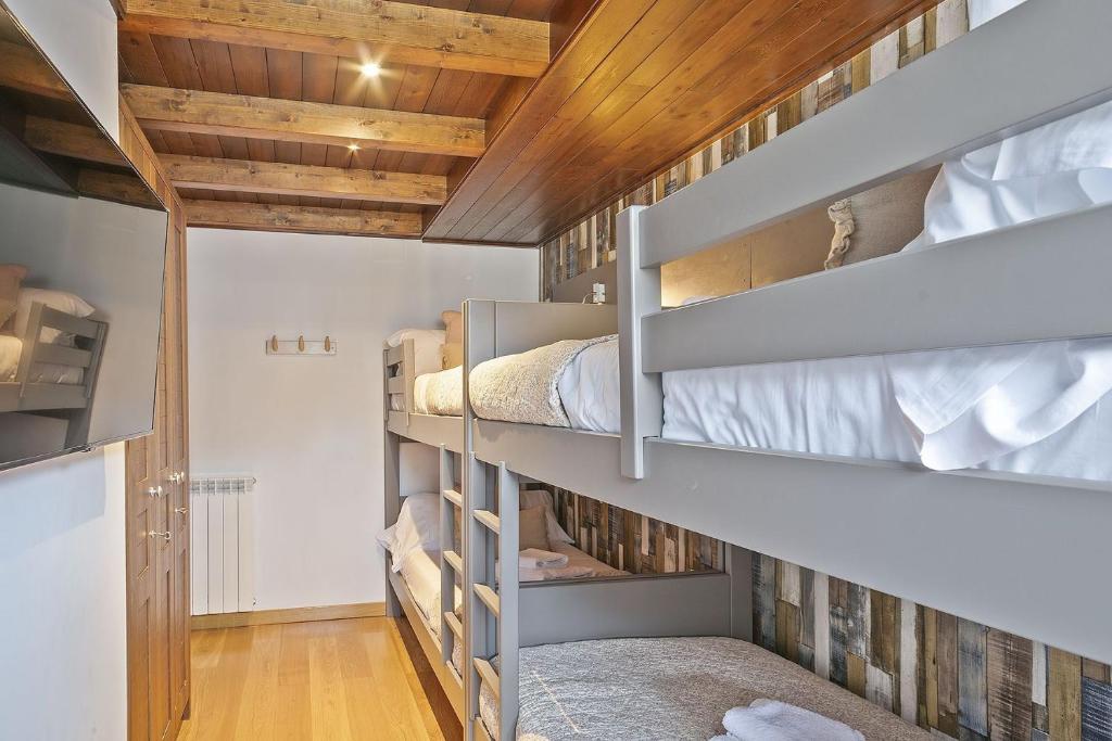 Postel nebo postele na pokoji v ubytování Luderna - Apartamento Val de Ruda B14 Paulet