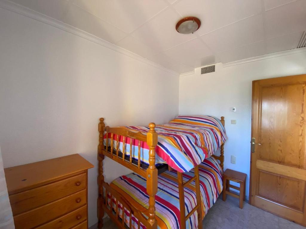 Postel nebo postele na pokoji v ubytování Apartamentos Ancosta