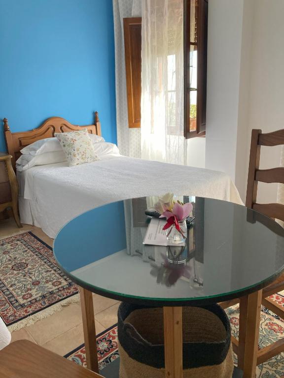Postel nebo postele na pokoji v ubytování Posada Las Torres