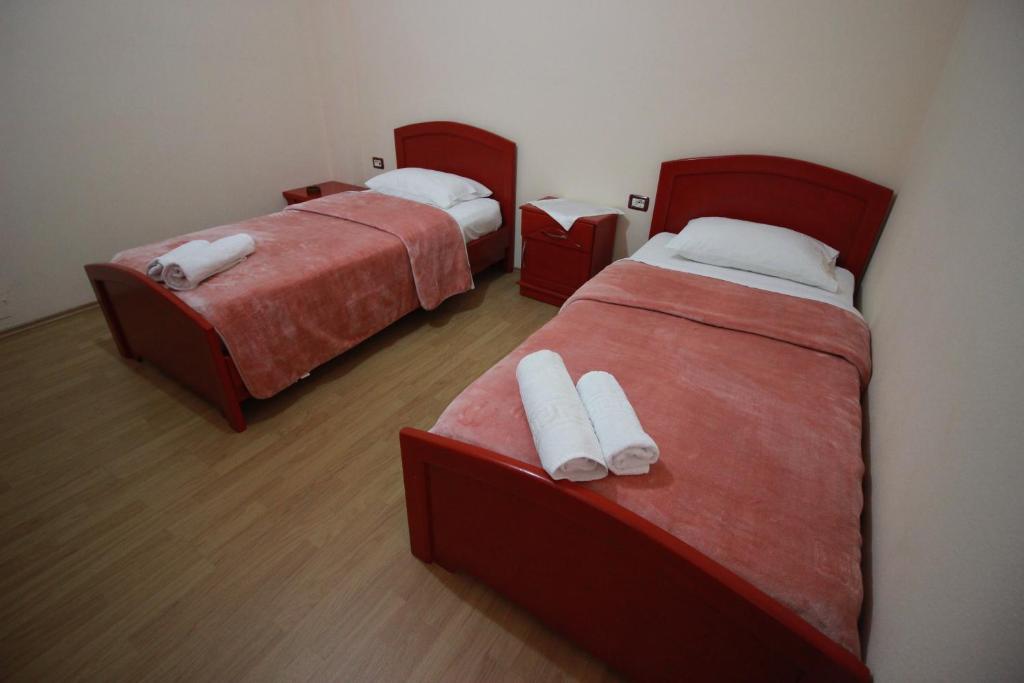 Postel nebo postele na pokoji v ubytování HOTEL RESTORANT VIKTORIA