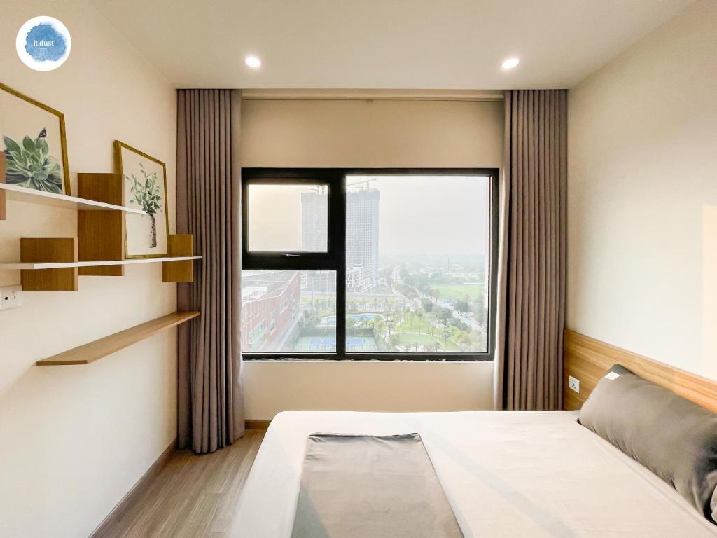 Ένα ή περισσότερα κρεβάτια σε δωμάτιο στο It Dust Homestay 6 - The Forest Apartment