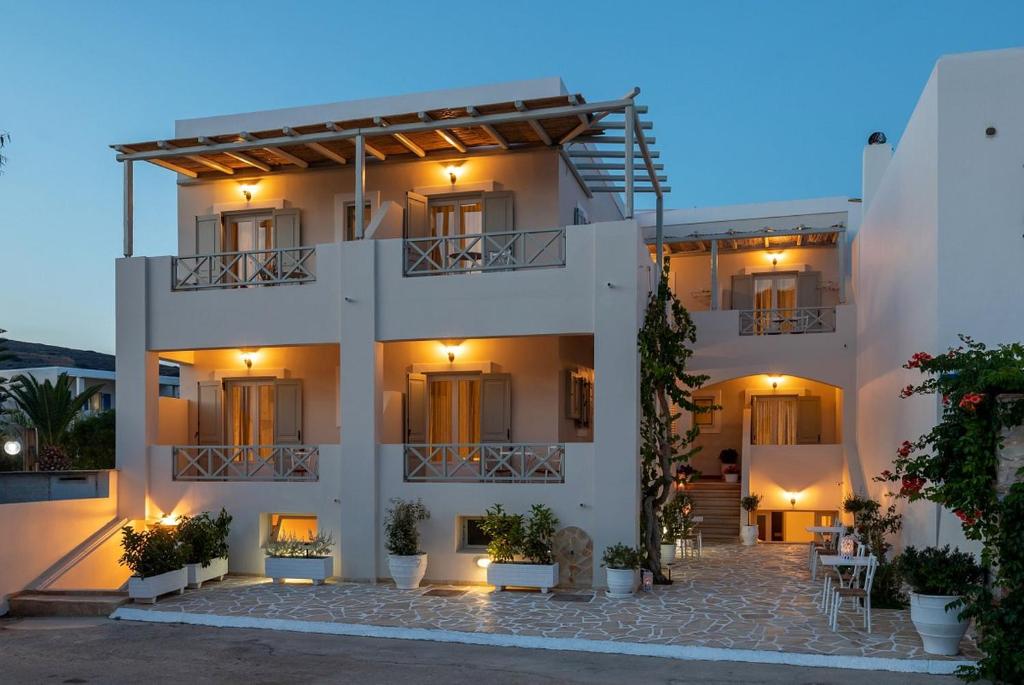 a view of a white building with lights at Boutique Mare in Galissas