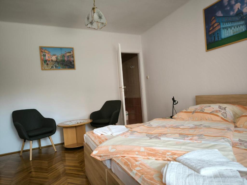 Posteľ alebo postele v izbe v ubytovaní Oleander Vendégház
