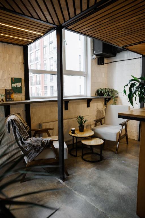 Posezení v ubytování Capsule Hotel Constellation 91