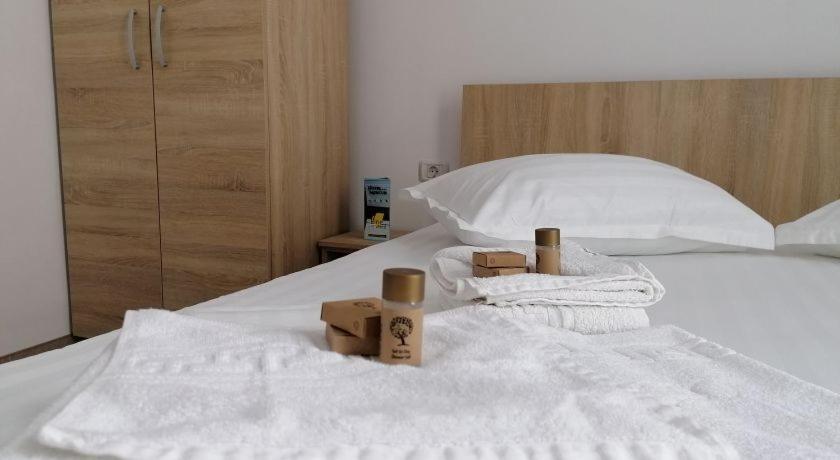 Postel nebo postele na pokoji v ubytování Hotel Mercur