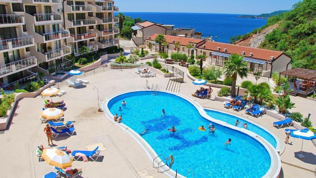 an image of a swimming pool at a resort at APARTMAN NIKA BUDVA-PRZNO in Budva