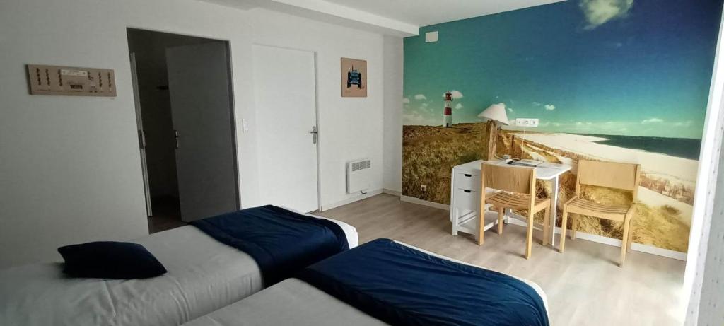 Postel nebo postele na pokoji v ubytování Escales dans les dunes