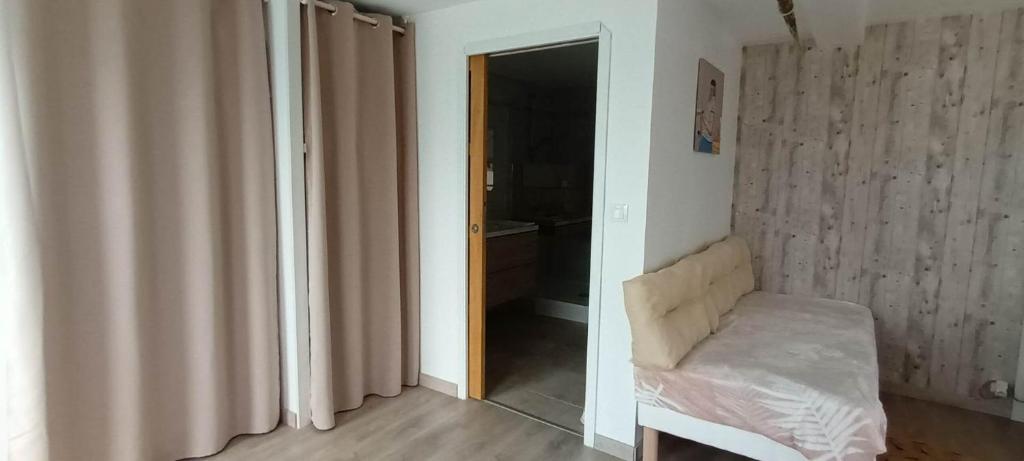 Postel nebo postele na pokoji v ubytování Escales dans les dunes