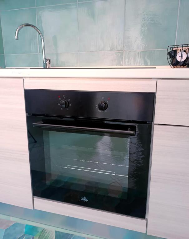 Kuchyň nebo kuchyňský kout v ubytování L'Eden di Turo Brand New Loft
