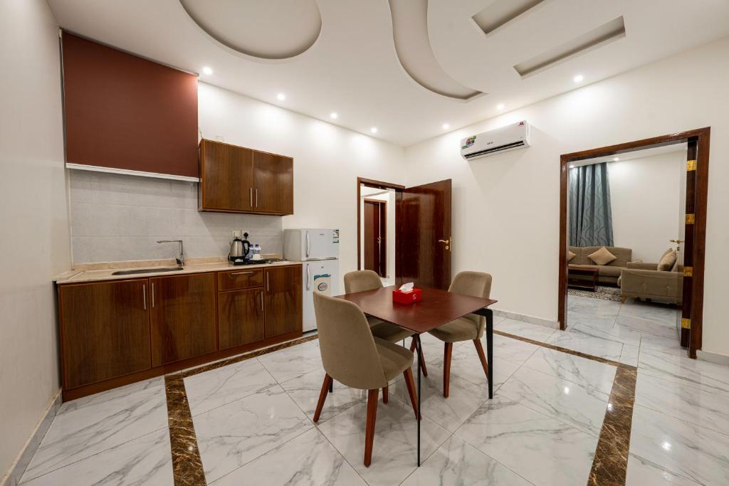 Kuchyň nebo kuchyňský kout v ubytování Masharef Abha Suites