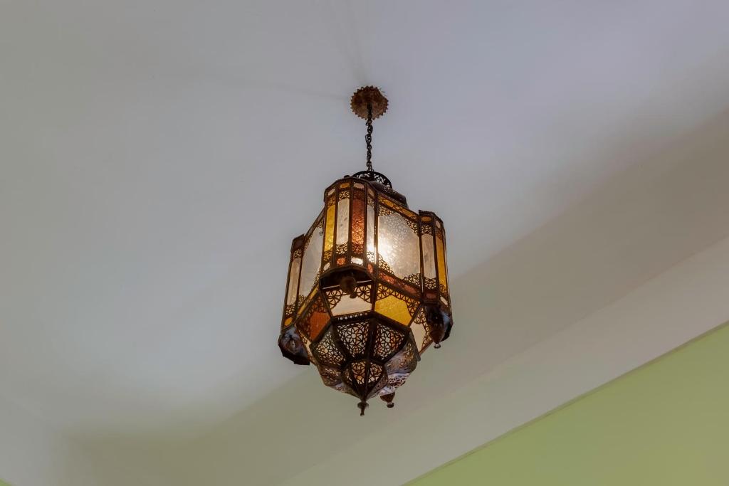a chandelier hanging from a ceiling at Casa da Moura in Lagos