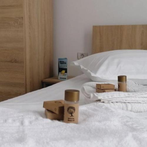 Postel nebo postele na pokoji v ubytování Hotel Mercur
