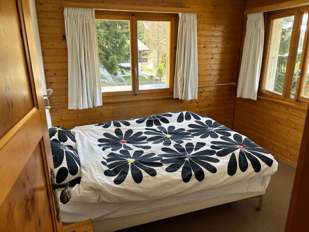 Postel nebo postele na pokoji v ubytování Chalet Claire