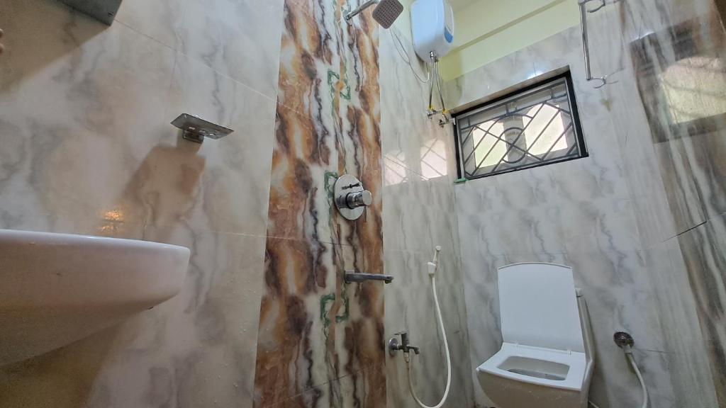 Ein Badezimmer in der Unterkunft Laxmi Niwas, Salt Lake, Kolkata, 10mins from Sector 5