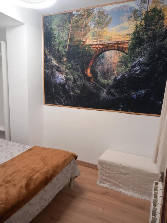A bed or beds in a room at Apartamento Plano Royo 2º