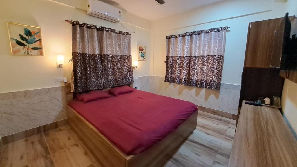 Ein Bett oder Betten in einem Zimmer der Unterkunft Laxmi Niwas, Salt Lake, Kolkata, 10mins from Sector 5
