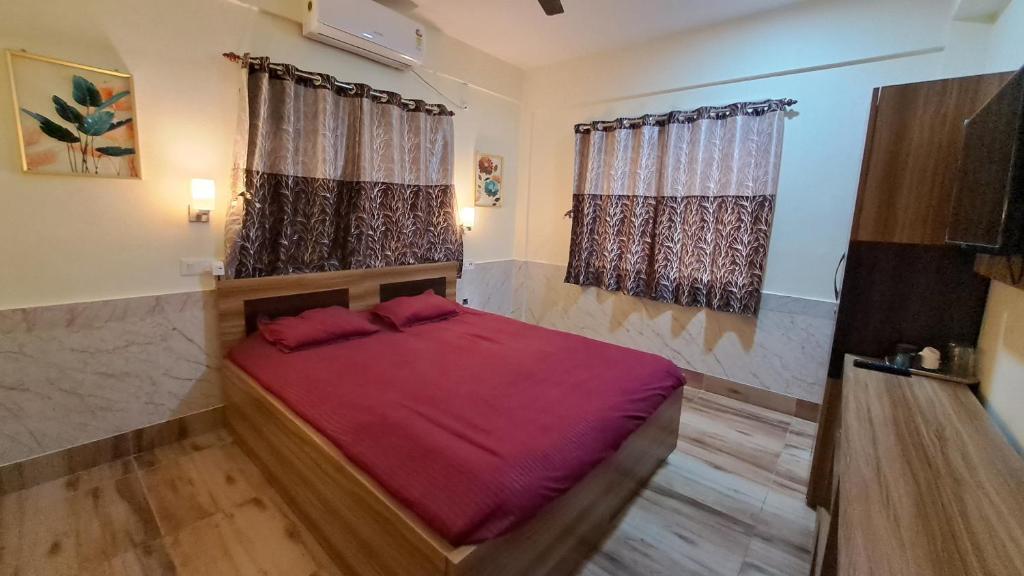 Ein Bett oder Betten in einem Zimmer der Unterkunft Laxmi Niwas, Salt Lake, Kolkata, 10mins from Sector 5