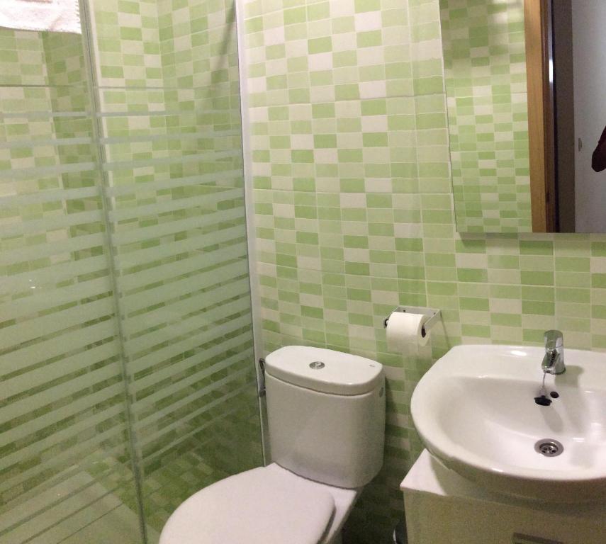 Koupelna v ubytování Apartamentos del Casco