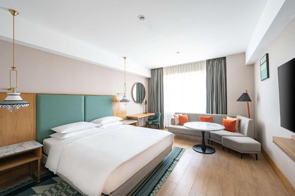 Postel nebo postele na pokoji v ubytování Hyatt Regency Nairobi Westlands