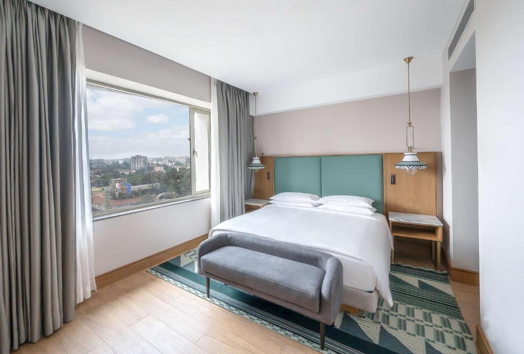 Postel nebo postele na pokoji v ubytování Hyatt Regency Nairobi Westlands