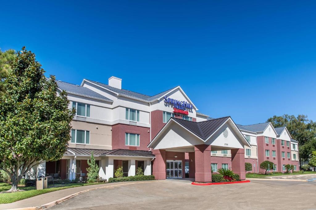 una representación de un hotel en un estacionamiento en SpringHill Suites by Marriott Houston Brookhollow en Houston