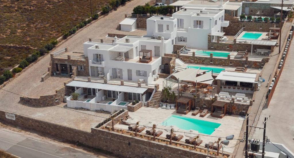 an aerial view of a house with a swimming pool at Senses Luxury Suites & Villas in Elia Beach