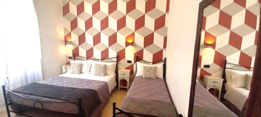 Postel nebo postele na pokoji v ubytování B&B Acanto Lecce