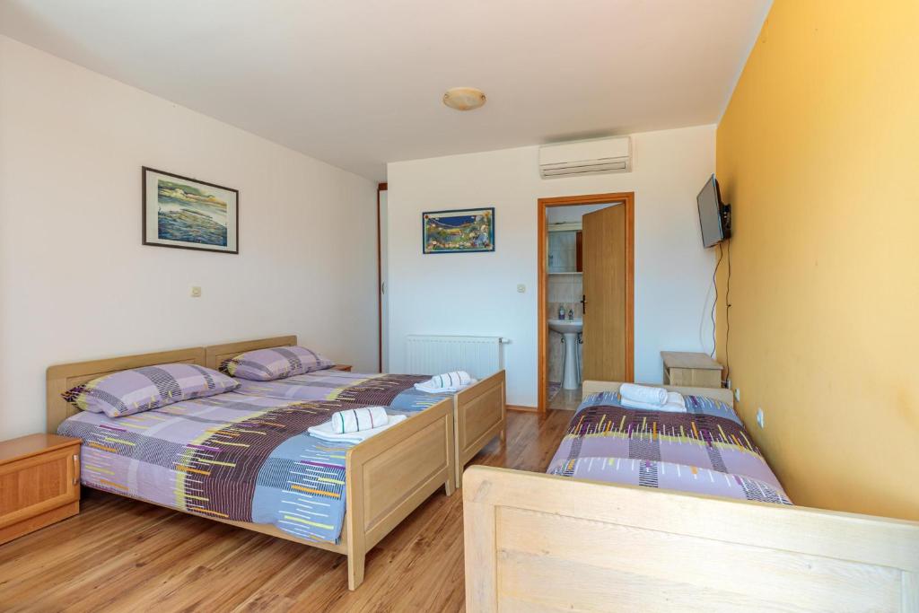 Postel nebo postele na pokoji v ubytování Pool & Fun House Betiga 1 with Gym