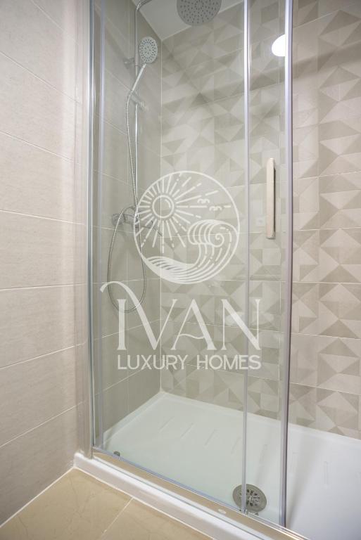 Koupelna v ubytování Casa Ralf Ivan Luxury Homes 9ªPlta Sur 1ªLinea