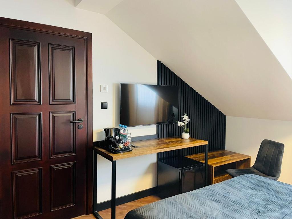 Posteľ alebo postele v izbe v ubytovaní Hotel Millennium