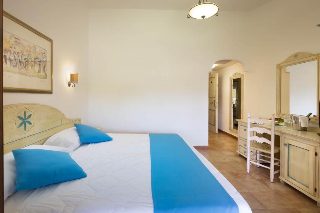 Postel nebo postele na pokoji v ubytování Hotel Villa Campana