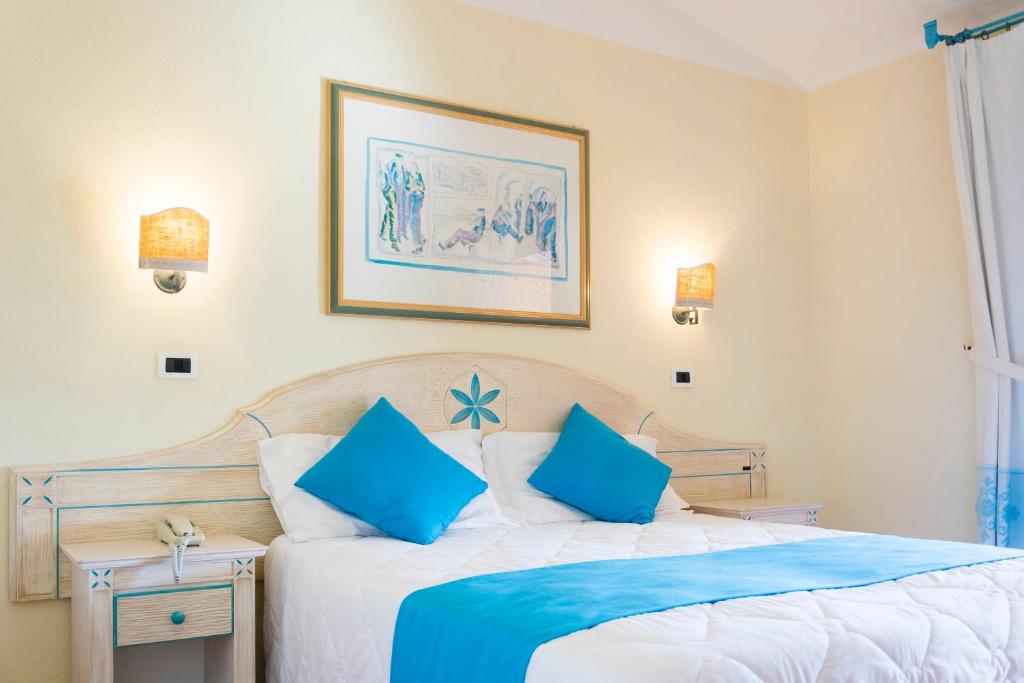 Postel nebo postele na pokoji v ubytování Hotel Villa Campana