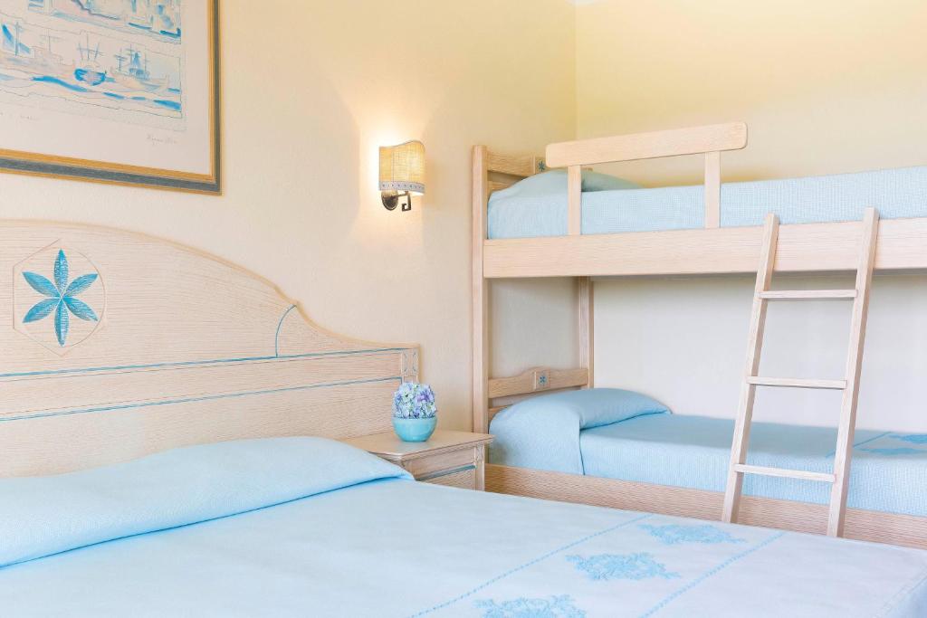 Postel nebo postele na pokoji v ubytování Hotel Villa Campana