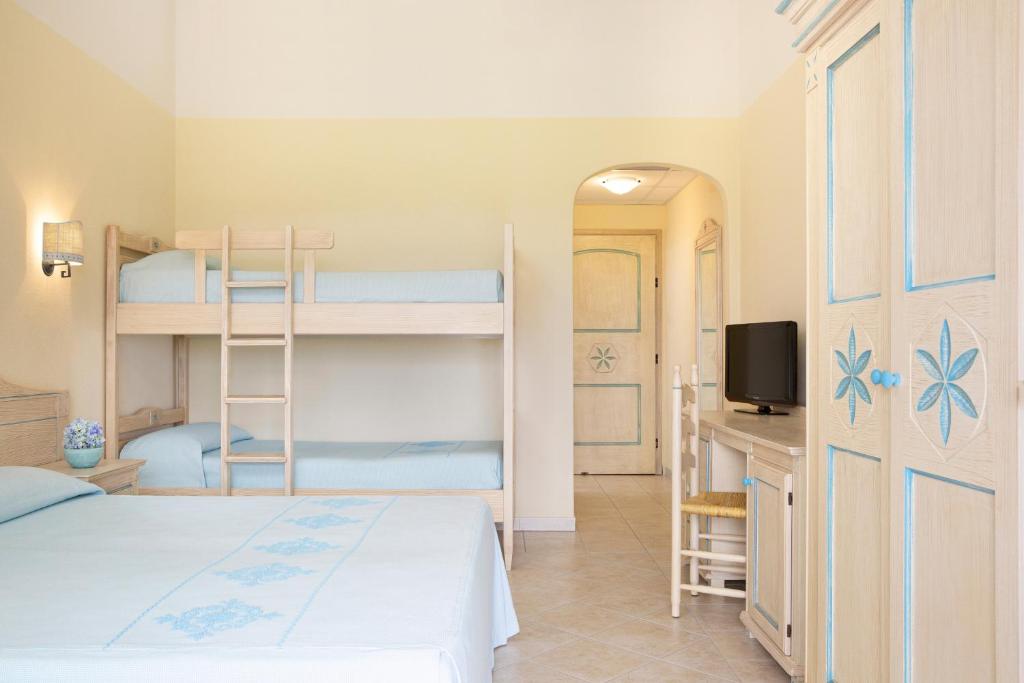 Postel nebo postele na pokoji v ubytování Hotel Villa Campana