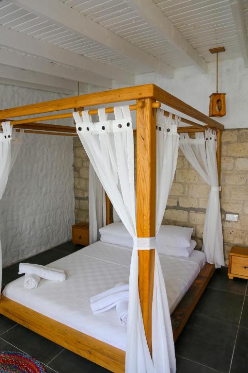 Postel nebo postele na pokoji v ubytování Rikas Boutique Otel
