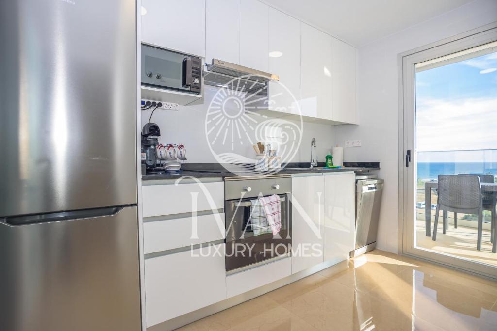 Kuchyň nebo kuchyňský kout v ubytování Casa Ralf Ivan Luxury Homes 9ªPlta Sur 1ªLinea