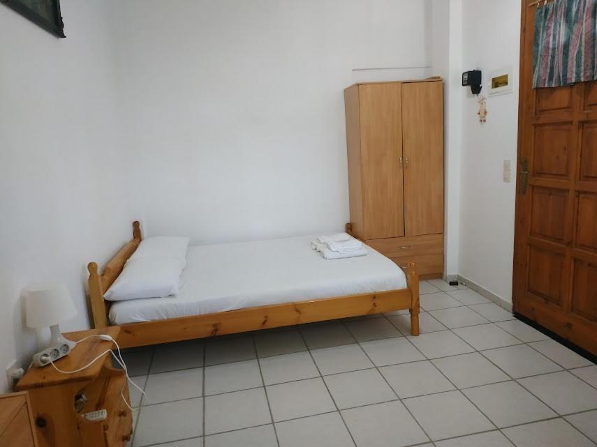 Кровать или кровати в номере The Mesaktis River Rooms 1