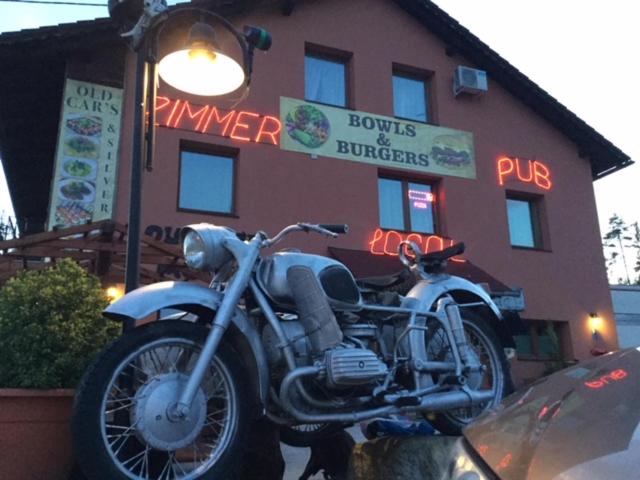 a motorcycle parked in front of a building at Silver Bike Motel in Velden am Wörthersee