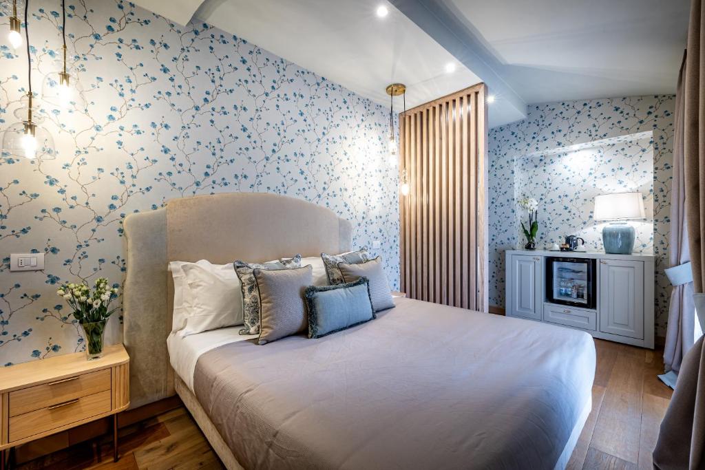 Postel nebo postele na pokoji v ubytování Hotel La Scaletta al Ponte Vecchio