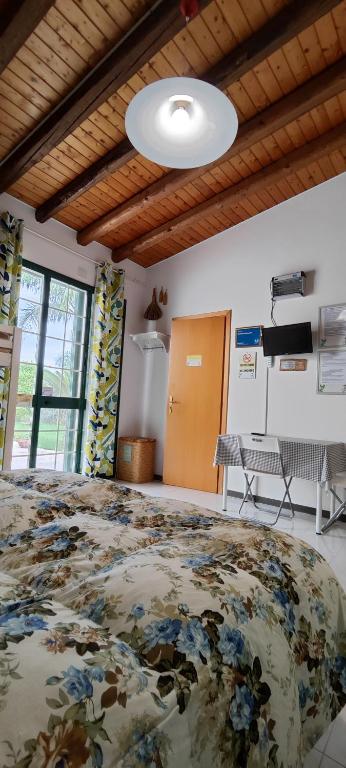 Postel nebo postele na pokoji v ubytování Voscenza Benerica