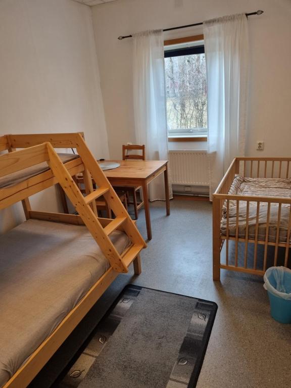 Postel nebo postele na pokoji v ubytování Torsby Vandrarhem