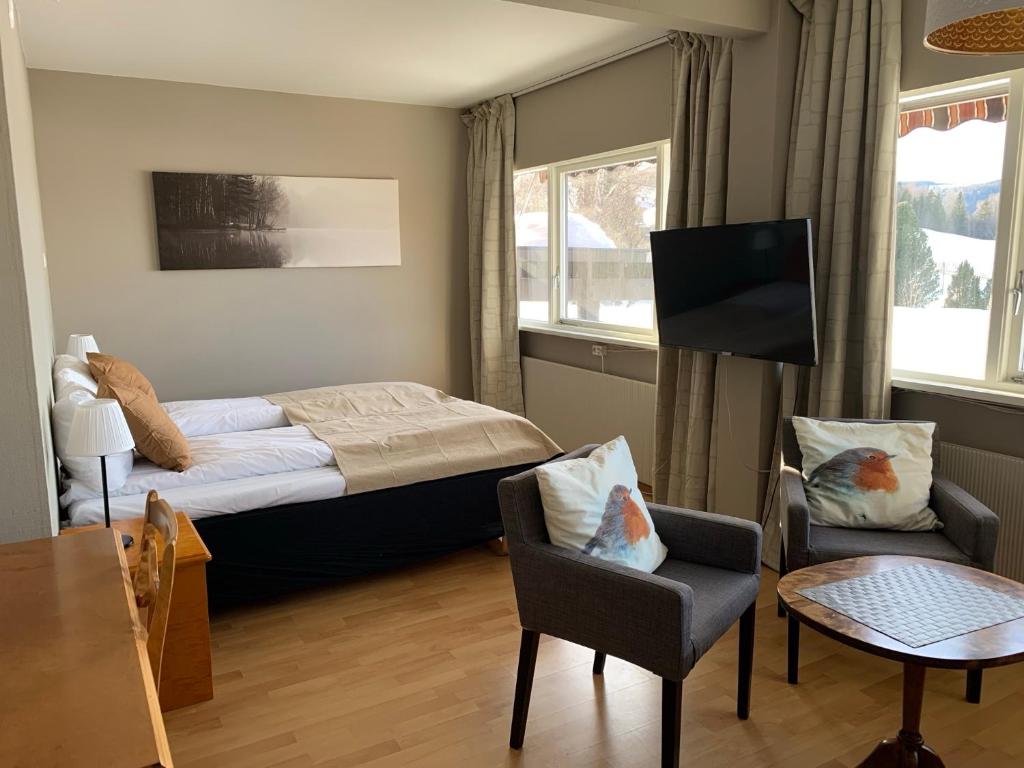 Postel nebo postele na pokoji v ubytování Honne Hotell